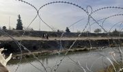 Razor wire is strung along the U.S.-Mexico border in El Paso, Texas, on Tuesday, Dec. 20, 2022. (AP Photo/Giovanna Dell&#x27;Orto)