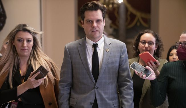 Rep. Matt Gaetz, R-Fla., is questioned by reporters, Friday, Jan. 6, 2023, ahead of the 14th vote for Speaker of the House, on Capitol Hill in Washington. (AP Photo/Jacquelyn Martin)