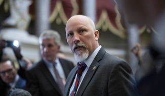 Rep. Chip Roy, R-Texas, a member of the conservative Freedom Caucus, talks to reporters in Statuary Hall about their opposition to voting for Rep. Kevin McCarthy, R-Calif., to be speaker of the House, at the Capitol in Washington, Friday, Jan. 6, 2023. (AP Photo/J. Scott Applewhite)
