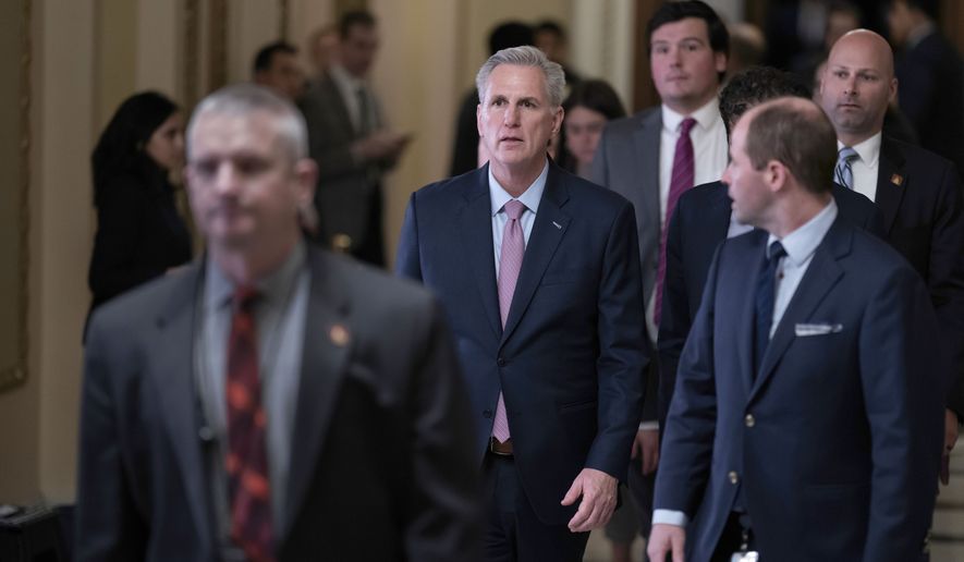 Newly-elected Speaker of the House Kevin McCarthy, R-Calif., walks to his office from the chamber after a contentious battle to lead the GOP majority in the 118th Congress, at the Capitol in Washington, Saturday, Jan. 7, 2023. (AP Photo/J. Scott Applewhite)