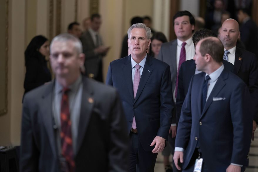 Newly-elected Speaker of the House Kevin McCarthy, R-Calif., walks to his office from the chamber after a contentious battle to lead the GOP majority in the 118th Congress, at the Capitol in Washington, Saturday, Jan. 7, 2023. (AP Photo/J. Scott Applewhite)