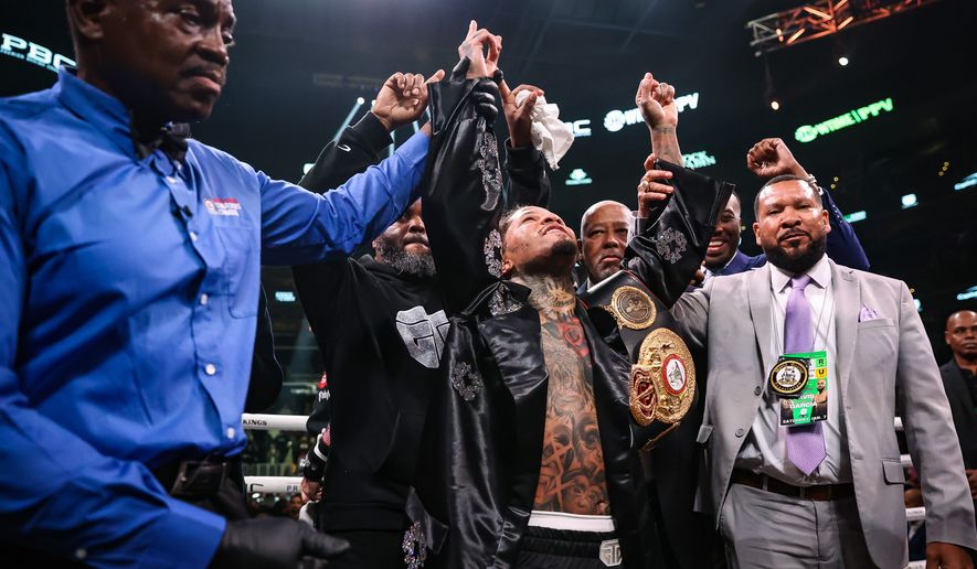 Baltimore boxer Gervonta Davis celebrates after being named the winner by technical knockout in the ninth round of his fight against Hector Luis Garcia to retain his WBA lightweight belt at Capital One Arena. (Photo courtesy of Amanda Westcott/SHOWTIME)
