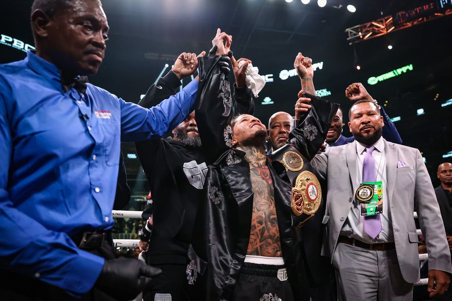 Baltimore boxer Gervonta Davis celebrates after being named the winner by technical knockout in the ninth round of his fight against Hector Luis Garcia to retain his WBA lightweight belt at Capital One Arena. (Photo courtesy of Amanda Westcott/SHOWTIME)