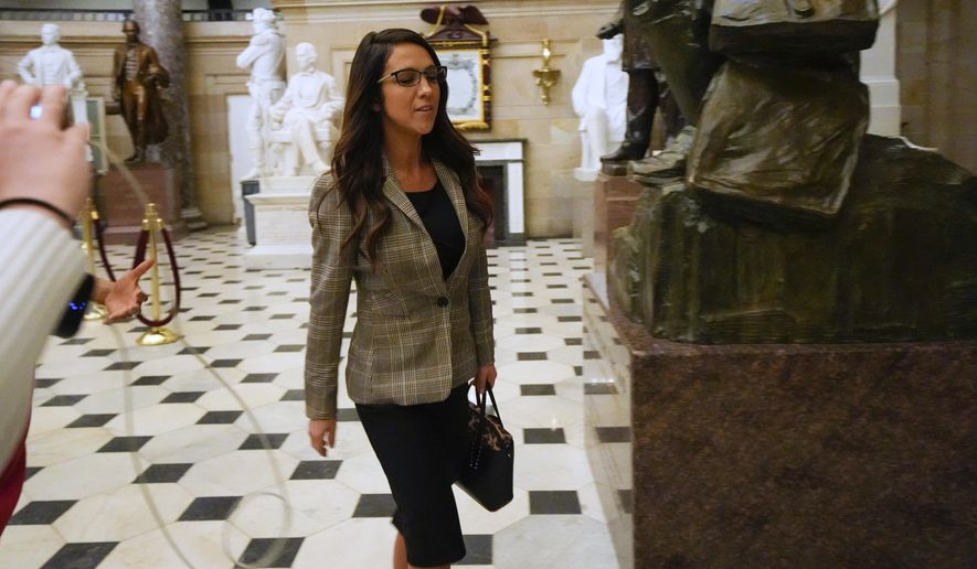 Rep. Lauren Boebert, R-Colo., walks to the House chamber as the House meets for the third day to elect a speaker and convene the 118th Congress in Washington, Thursday, Jan. 5, 2023. (AP Photo/Julio Cortez)