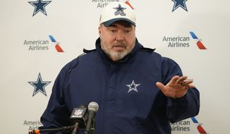 Dallas Cowboys head coach Mike McCarthy speaking to members of media after an NFL football game against the Washington Commanders, Sunday, Jan. 8, 2023, in Landover, Md. Washington won 26-6. (AP Photo/Patrick Semansky)