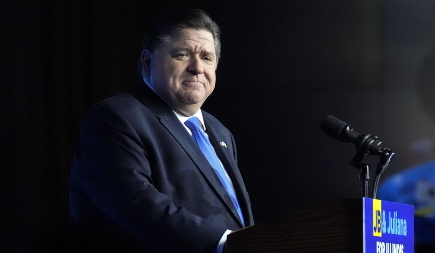 Illinois Gov. J.B. Pritzker looks to supporters after he defeated GOP challenger Darren Bailey on Nov. 8, 2022, in Chicago. On Saturday, Jan. 7, 2023, a day after Illinois House Democrats approved pay raises for top government officials in late-night budget legislation — include a 16% hike for them — Pritzker told reporters that he only asked lawmakers to approve increase for his departments heads in order to attract top talent. He said the Legislature is a co-equal branch of government and he is focused on the executive branch. (AP Photo/Nam Y. Huh, File)