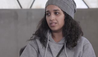 In this image taken from video Hoda Muthana talks during an interview in Roj detention camp in Syria where she is being held by U.S.-allied Kurdish forces, Wednesday, Nov. 9, 2022. Muthana, who ran away from home in Alabama at the age of 20, joined the Islamic State group and had a child with one of its fighters says she still hopes to return to the United States, serve prison time if necessary, and advocate against the extremists. (AP Photo/The News Movement)