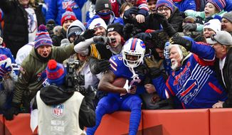 Buffalo Bills wide receiver John Brown (16) celebrates his touchdown during the second half of an NFL football game against the New England Patriots, Sunday, Jan. 8, 2023, in Orchard Park. (AP Photo/Adrian Kraus)