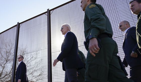 President Joe Biden walks along the U.S.-Mexico border in El Paso, Texas, Sunday, Jan. 8, 2023. (AP Photo/Andrew Harnik) ** FILE **