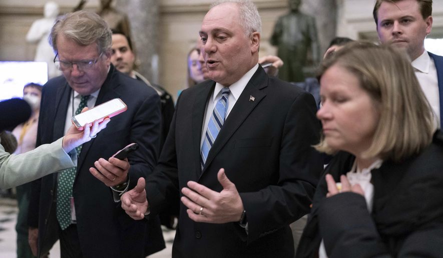 Rep. Steve Scalise, R-La., walks to the House chamber as he speaks to reporters as the House meets for the fourth day to try and elect a speaker and convene the 118th Congress in Washington, Friday, Jan. 6, 2023. (AP Photo/Jose Luis Magana)