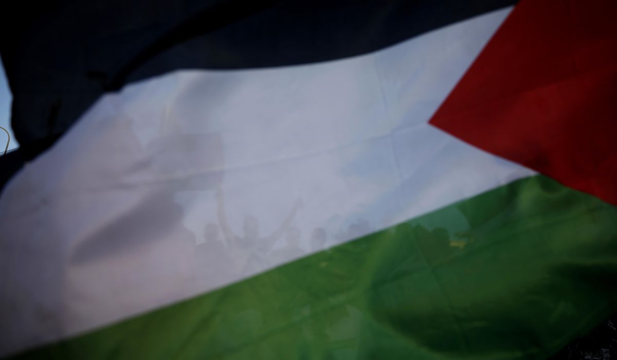 NextImg:Palestinian flag hung from public Hanukkah menorah near Yale University sparks outcry