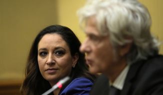 Lawyer Laura Sgro, left, listens to her client Pietro Orlandi, brother of Manuela, a 15-year-old daughter of a Vatican employee who disappeared in 1983, during a press conference on the establishing of a parliamentary investigative commission on Manuela Orlandi and other cold cases, in Rome, Dec. 20, 2022. The Vatican has reopened the investigation into the 1983 disappearance of the 15-year-old daughter of a Vatican employee, months after a new Netflix documentary purported to shed new light on the case and weeks after her family asked the Italian Parliament to take up the cause. On Monday, Jan. 9, 2023, Pietro Orlandi called the prosecutor&#39;s decision a “positive step” that the Vatican has apparently changed its mind, gotten over its resistance and now will go over the case from the start. (AP Photo/Alessandra Tarantino, File)