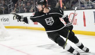 Los Angeles Kings&#39; Adrian Kempe (9) celebrates his goal against the Edmonton Oilers during the second period of an NHL hockey game Monday, Jan. 9, 2023, in Los Angeles. (AP Photo/Jae C. Hong)
