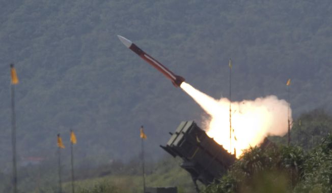 A U.S.-made Patriot missile is launched during an annual exercises in Ilan County, 49 miles west of Taipei, Taiwan, on July 20, 2006. Patriot missile systems have long been a hot ticket item for the U.S. and allies in contested areas of the world as a coveted shield against incoming missiles. In Europe, the Middle East and the Pacific, they guard against potential strikes from Iran, Somalia and North Korea. So it was a critical turning point when news broke this week that the U.S. has agreed to send a Patriot missile battery to Ukraine (AP Photo/File)