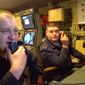 In this handout photo taken from video released by Russian Defense Ministry Press Service on Tuesday, Jan. 10, 2023, Officers are on duty in the control room of the Admiral Gorshkov frigate of the Russian navy. Admiral Gorshkov, which is armed with the top-of-the-line Zircon hypersonic missiles, set off on a trans-ocean cruise last week. (Russian Defense Ministry Press Service via AP)