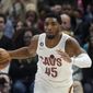 Cleveland Cavaliers guard Donovan Mitchell (45) brings the ball up during the first half of the team&#x27;s NBA basketball game against the Utah Jazz on Tuesday, Jan. 10, 2023, in Salt Lake City. (AP Photo/Rick Bowmer)