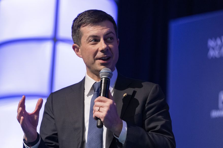 Transportation Secretary Pete Buttigieg, speaks to the Transportation Research Board gathering in Washington, Wednesday, Jan. 11, 2023. The world's largest aircraft fleet was grounded for hours by a cascading outage in a government system that delayed or canceled thousands of flights across the U.S. on Wednesday. (AP Photo/Manuel Balce Ceneta)