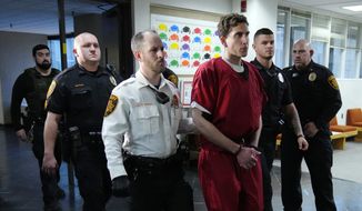 Bryan Kohberger, who is accused of killing four University of Idaho students, leaves after an extradition hearing at the Monroe County Courthouse in Stroudsburg, Pa., Tuesday, Jan. 3, 2023. (AP Photo/Matt Rourke, Pool, File)