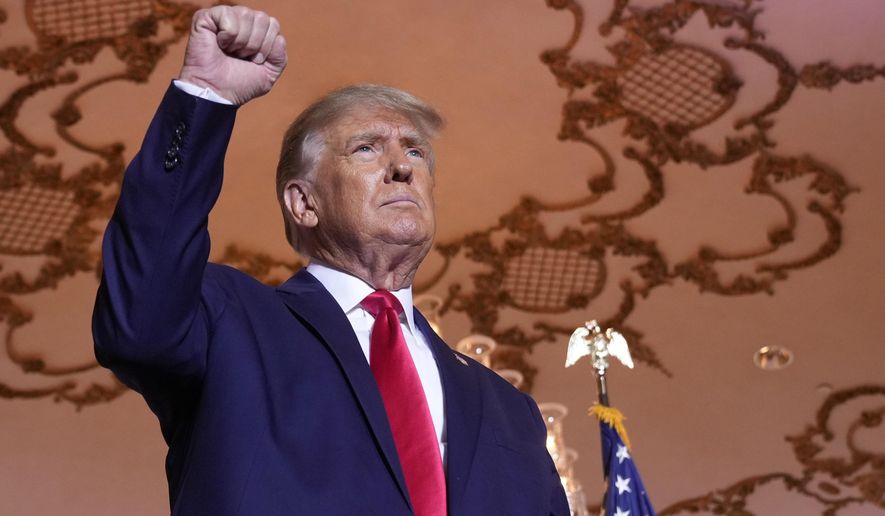 Former President Donald Trump stands on stage after announcing a third run for president as he speaks at Mar-a-Lago in Palm Beach, Fla., Nov. 15, 2022. Trump is planning to hold the first public campaign event of his 2024 White House bid in the early-voting state of South Carolina. (AP Photo/Andrew Harnik) **FILE**