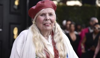 FILE - Joni Mitchell arrives at the 64th Annual Grammy Awards at the MGM Grand Garden Arena on Sunday, April 3, 2022, in Las Vegas. Mitchell will be honored with the Library of Congress Gershwin Prize for Popular Song. (Photo by Jordan Strauss/Invision/AP, File)