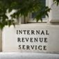 A sign outside the Internal Revenue Service building in Washington, on May 4, 2021. (AP Photo/Patrick Semansky, File)