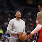 Washington Wizards guard Bradley Beal, left, handles a basketball next to teammate forward Rui Hachimura (8) during a break in the action in the second half of an NBA basketball game against the New York Knicks, Friday, Jan. 13, 2023, in Washington. Beal is out with an injury. (AP Photo/Nick Wass) **FILE**