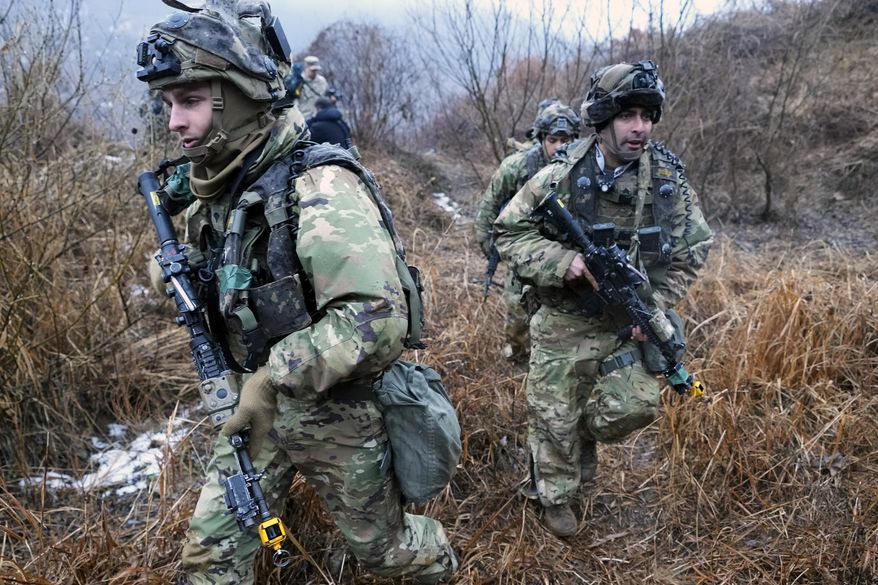 U.S. Army soldiers march during a joint military drill between South Korea and the United States in Paju, South Korea, Friday, Jan. 13, 2023. The drill involved the "Army Tiger Demonstration Brigade", which has been created to support South Korean Army's integration and use of Industry 4.0 technologies. (AP Photo/Ahn Young-joon) **FILE**