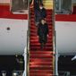Japanese Prime Minister Fumio Kishida walks down the steps as he arrives, Thursday, Jan. 12, 2023, at Andrews Air Force Base, Md.(AP Photo/Alex Brandon)