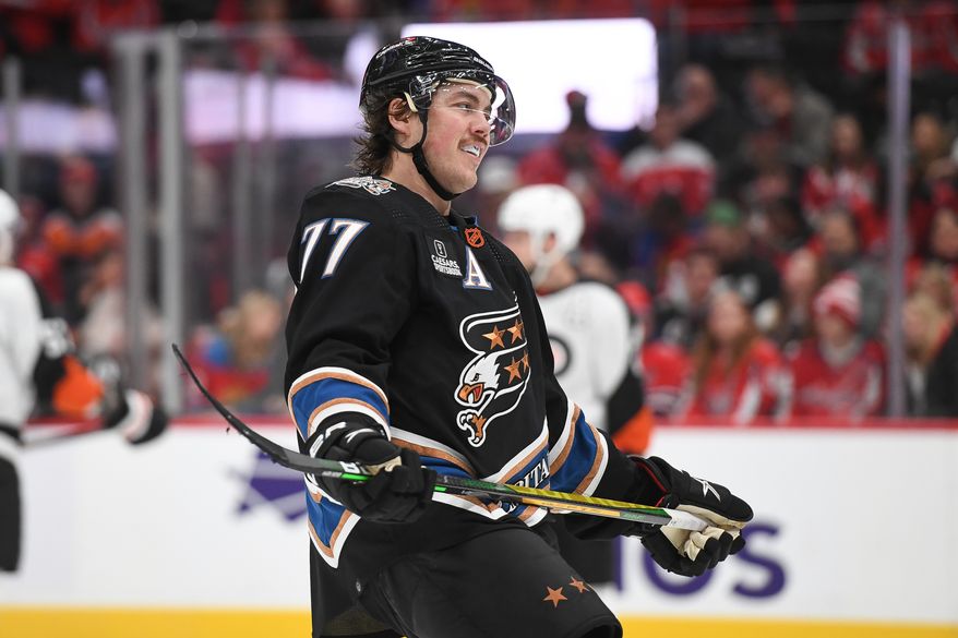 Washington Capitals right wing T.J. Oshie (77) skating during a break in the action during the 1st period in an NHL game against the Philadelphia Flyers at Capital One Arena in Washington D.C., January 14, 2023. (Photo by Billy Sabatini)