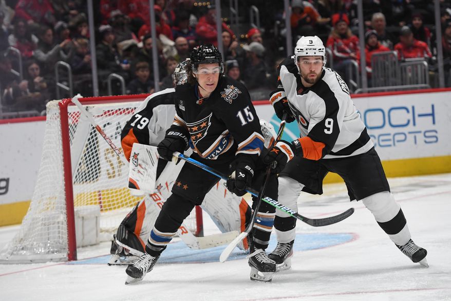Washington Capitals left wing Sonny Milano (15) fighting for position in front of the net during the 2nd period in an NHL game against the Philadelphia Flyers at Capital One Arena in Washington D.C., January 14, 2023. (Photo by Billy Sabatini)