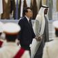 South Korean President Yoon Suk Yeol, center left, and Emirati leader Sheikh Mohammed bin Zayed Al Nahyan walk past an honor guard at Qasar Al Watan in Abu Dhabi, United Arab Emirates, Sunday, Jan. 15, 2023. Yoon received an honor guard welcome Sunday on a trip to the United Arab Emirates, where Seoul hopes to expand its military sales while finishing its construction of the Arabian Peninsula&#39;s first nuclear power plant. (AP Photo/Jon Gambrell)