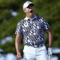 Si Woo Kim yawns on the second tee during the final round of the Sony Open golf tournament, Sunday, Jan. 15, 2023, at Waialae Country Club in Honolulu. (AP Photo/Matt York)