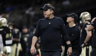 New Orleans Saints head coach Sean Payton walks on the field before an NFL football game against the Carolina Panthers in New Orleans, Jan. 2, 2022. The Carolina Panthers have received permission from the New Orleans Saints to interview Sean Payton for their vacant head coaching position, according to a person familiar with the situation. (AP Photo/Derick Hingle, File) **FILE**