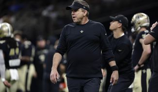 New Orleans Saints head coach Sean Payton walks on the field before an NFL football game against the Carolina Panthers in New Orleans, Jan. 2, 2022. The Carolina Panthers have received permission from the New Orleans Saints to interview Sean Payton for their vacant head coaching position, according to a person familiar with the situation. (AP Photo/Derick Hingle, File)