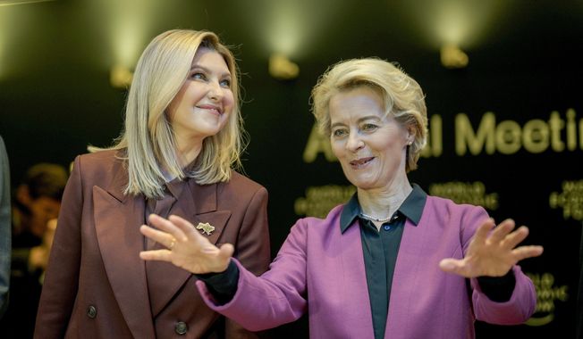 First lady of Ukraine Olena Zelenska, left, and EU Commission President Ursula von der Leyen attend a session at the World Economic Forum in Davos, Switzerland Tuesday, Jan. 17, 2023. The annual meeting of the World Economic Forum is taking place in Davos from Jan. 16 until Jan. 20, 2023. (AP Photo/Markus Schreiber)