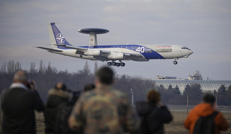 A NATO AWACS aircraft lands at the Baza 90 Romanian air force base in Otopeni, Romania, Tuesday, Jan. 17, 2023. Two of three NATO surveillance planes arrived at an air base near Romania&#x27;s capital Tuesday where they are set to undertake regional reconnaissance missions to &quot;monitor Russian military activity&quot; within the 30-nation military alliance&#x27;s territory. (AP Photo/Vadim Ghirda)