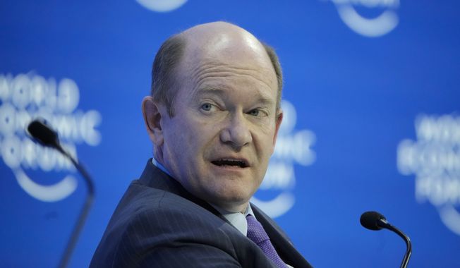 Sen. Chris Coons, D-Del., speaks on a panel at the World Economic Forum in Davos, Switzerland Tuesday, Jan. 17, 2023. The annual meeting of the World Economic Forum is taking place in Davos from Jan. 16 until Jan. 20, 2023. (AP Photo/Markus Schreiber)
