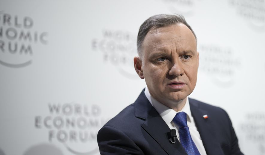 Poland&#x27;s President Andrzej Duda attends a session at the World Economic Forum in Davos, Switzerland Tuesday, Jan. 17, 2023. The annual meeting of the World Economic Forum is taking place in Davos from Jan. 16 until Jan. 20, 2023. (AP Photo/Markus Schreiber)