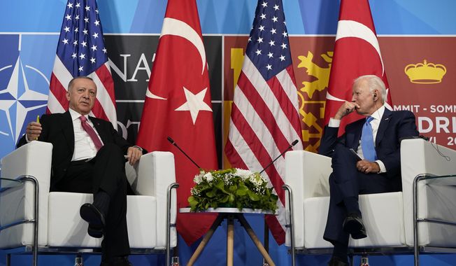 President Joe Biden, right, meets with Turkey&#x27;s President Recep Tayyip Erdogan, left, during the NATO summit in Madrid, June 29, 2022. Turkey and the United States will aim to smooth out a series of disagreements between the NATO allies when Turkey&#x27;s foreign minister visits this week but expectations that outstanding issues can be resolved are slim. (AP Photo/Susan Walsh, File)