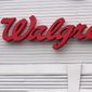 The Walgreens logo on the front of a store, July 14, 2021, in Cambridge, Mass. A huge opioid settlement dragged Walgreens to a $3.7 billion loss in its fiscal first quarter, but the drugstore chain still beat Wall Street forecasts. The company also reaffirmed its earnings forecast for the new year. Walgreens said Thursday, Jan. 5, 2023 that it recorded a $5.2-billion, after-tax charge in the quarter that ended November 30 for opioid-related litigation. (AP Photo/Charles Krupa, File)