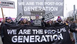 Anti-abortion activists march outside of the U.S. Supreme Court during the March for Life in Washington, Jan. 21, 2022. Anti-abortion activists will have multiple reasons to celebrate – and some reasons for unease -- when they gather Friday, Jan. 20, 2023 in Washington for the annual March for Life. The march has been held since January 1974 – a year after the U.S. Supreme Court’s Roe v. Wade decision established a nationwide right to abortion. (AP Photo/Jose Luis Magana) **FILE**