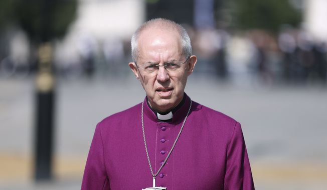 The Archbishop of Canterbury Justin Welby walks in Westminster on Sept. 14, 2022. The Church of England said Wednesday, Jan. 18, 2023, it will allow blessings for same-sex, civil marriages for the first time — but its position on gay marriage will not change and same-sex couples will still not be able to marry in its churches. The plans, to be outlined in a report to the General Synod, which meets in London next month, came after five years of debate and consultation on the church&#x27;s position on sexuality. (Richard Heathcote/Pool Photo via AP)