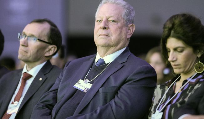 Former US Vice President Al Gore sits at the World Economic Forum in Davos, Switzerland, on Wednesday, Jan. 18, 2023. The annual meeting of the World Economic Forum is taking place in Davos from Jan. 16 until Jan. 20, 2023. (AP Photo/Markus Schreiber)