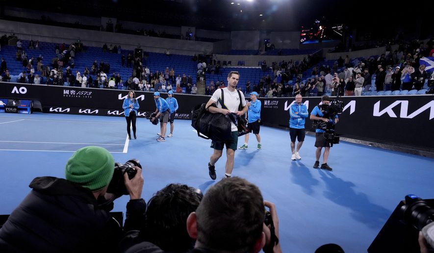 Andy Murray of Britain leaves Margaret Court Arena in the early hours of Friday Jan. 20, 2023, following his five set win over Australia&#x27;s Thanasi Kokkinakis at the Australian Open tennis championships in Melbourne, Australia. (AP Photo/Ng Han Guan)