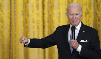 President Joe Biden speaks about people having someone to hold their hand when going through difficult times in the East Room of the White House to mayors who are attending the U.S. Conference of Mayors winter meeting in Washington, Friday, Jan 20, 2023,  (AP Photo/Susan Walsh)