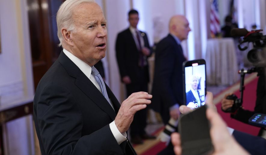 President Joe Biden talks with reporters after speaking in the East Room of the White House to mayors who are attending the U.S. Conference of Mayors winter meeting in Washington, Friday, Jan 20, 2023. (AP Photo/Susan Walsh)