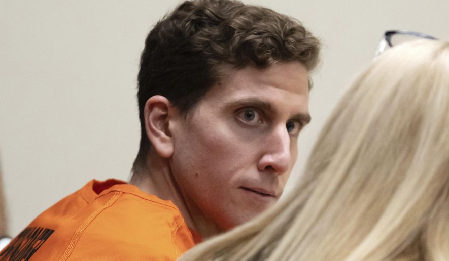 Bryan Kohberger, left, who is accused of killing four University of Idaho students in November 2022, looks toward his attorney, public defender Anne Taylor, right, during a hearing in Latah County District Court, Jan. 5, 2023, in Moscow, Idaho. Investigators seized stained bedding, strands of what looked like hair and a single glove — but no weapon — when they searched the Washington state apartment of Kohberger, a graduate student, charged with stabbing four University of Idaho students to death, according to court documents newly unsealed on Tuesday, Jan. 17, 2023. (AP Photo/Ted S. Warren, Pool)