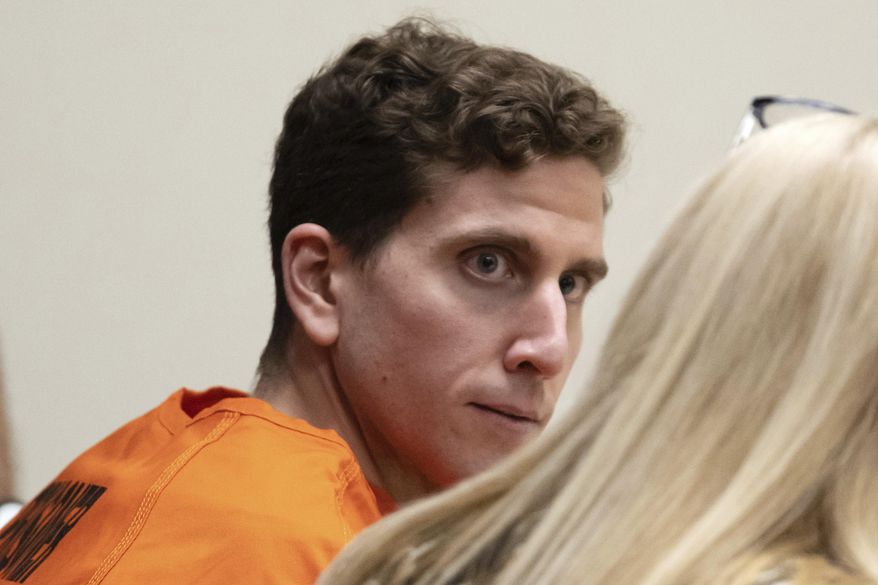 Bryan Kohberger, left, who is accused of killing four University of Idaho students in November 2022, looks toward his attorney, public defender Anne Taylor, right, during a hearing in Latah County District Court, Jan. 5, 2023, in Moscow, Idaho. Investigators seized stained bedding, strands of what looked like hair and a single glove — but no weapon — when they searched the Washington state apartment of Kohberger, a graduate student, charged with stabbing four University of Idaho students to death, according to court documents newly unsealed on Tuesday, Jan. 17, 2023. (AP Photo/Ted S. Warren, Pool)