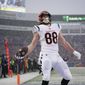 Cincinnati Bengals tight end Hayden Hurst (88) reacts after scoring a touchdown against the Buffalo Bills during the first quarter of an NFL division round football game, Sunday, Jan. 22, 2023, in Orchard Park, N.Y. (AP Photo/Seth Wenig)
