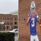 A mural by artist Adam Zyglis of Buffalo Bills player Damar Hamlin, who is recovering after going into cardiac arrest during a game Jan. 2, covers the outside of a building in Buffalo, N.Y., on Wednesday, Jan. 18, 2023. (AP Photo/Carolyn Thompson)